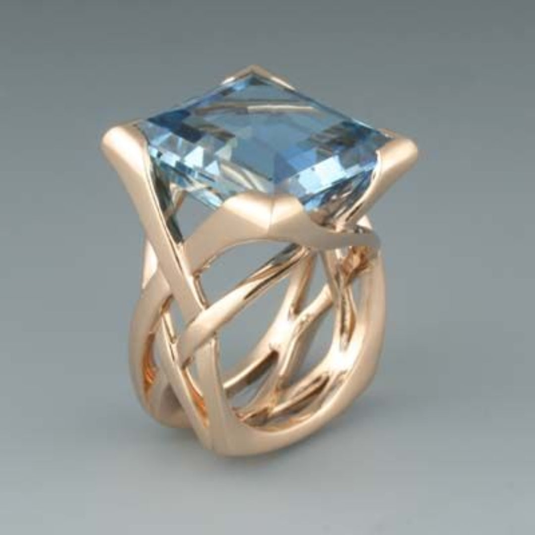 Vintage Roségold Ring mit blauen Zirkonia