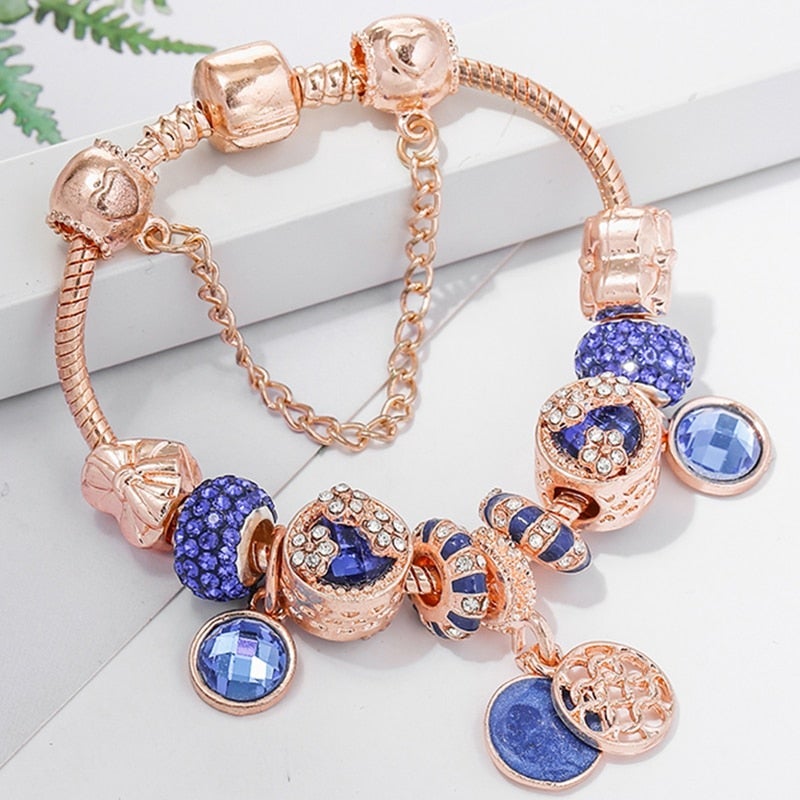 Rosésilbernes Armband mit blauem Kristall