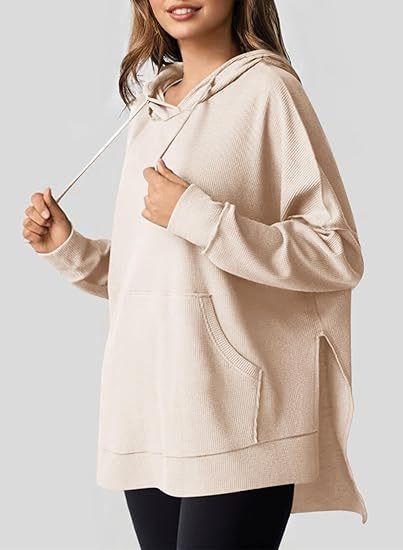 Damen Oversized Kapuzenpullover mit praktischen Eingrifftaschen und hochwertigem Strukturstoff Heidi-Mode