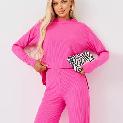 Damen cropped Langarmshirt mit modernem Knotendesign und feiner Rippstruktur Heidi-Mode