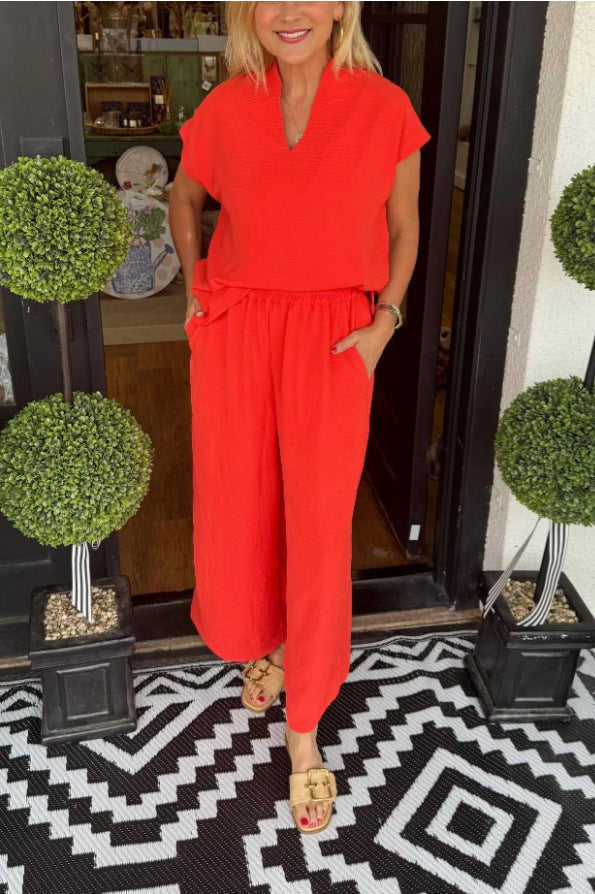 Damen Jumpsuit mit lockerer Passform und elegantem V-Ausschnitt Heidi-Mode