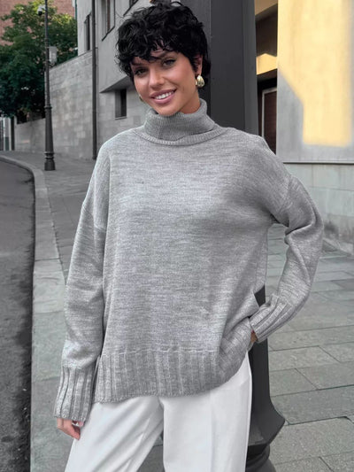 Damen Oversized Strickpullover mit hohem Kragen und seitlichen Schlitzen Heidi-Mode