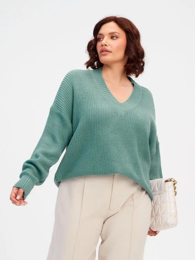 Damen lässiger Strickpullover mit V-Ausschnitt und übergroßen Ärmeln Heidi-Mode