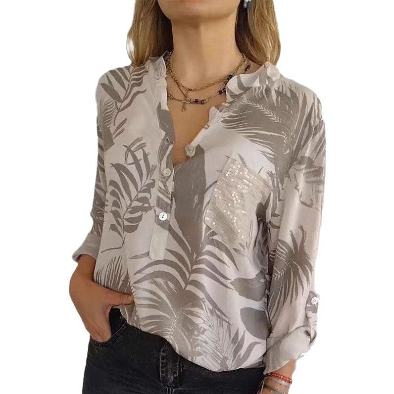 Damen Seidenbluse mit hochwertigem Palmblattmuster und eleganten Knopfdetails Heidi-Mode