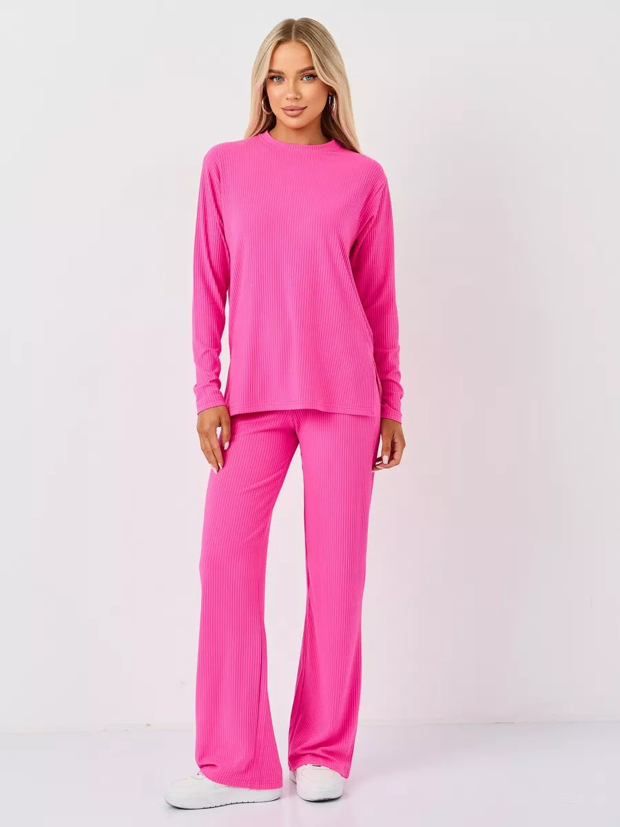 Damen cropped Langarmshirt mit modernem Knotendesign und feiner Rippstruktur Heidi-Mode