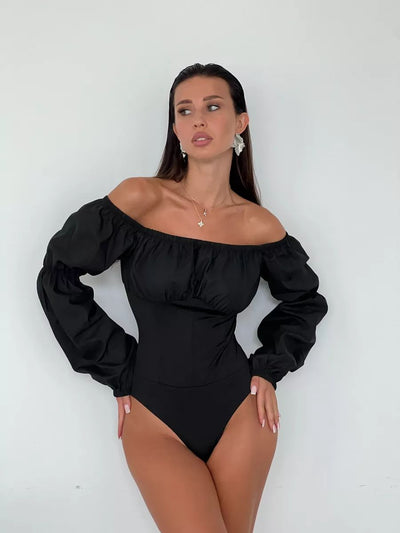 Damen Off-Shoulder Bodysuit mit voluminösen Ärmeln und figurbetontem Schnitt Heidi-Mode