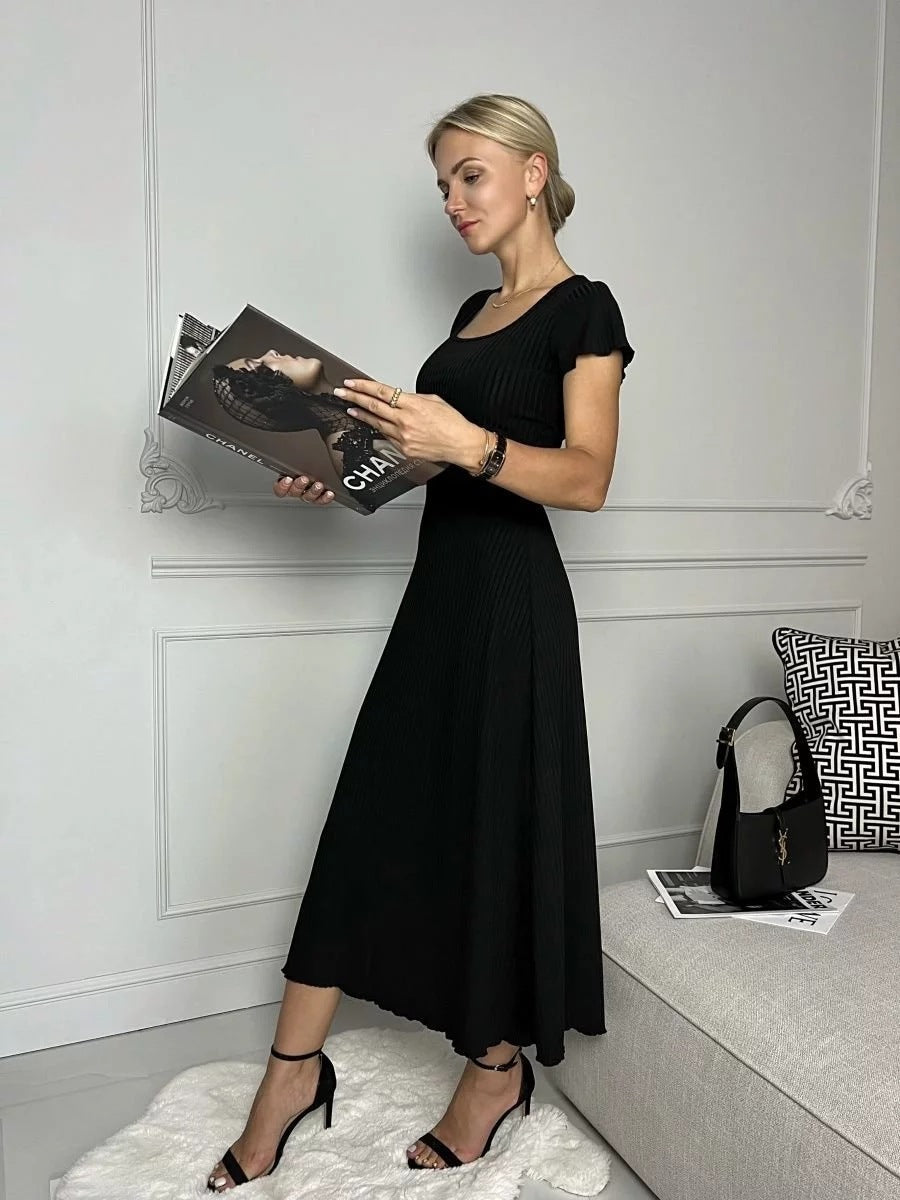 Damen Midikleid mit schickem Rippenstruktur und eleganten Puffärmeln Heidi-Mode