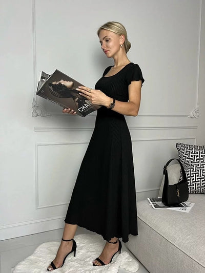 Damen Midikleid mit schickem Rippenstruktur und eleganten Puffärmeln Heidi-Mode