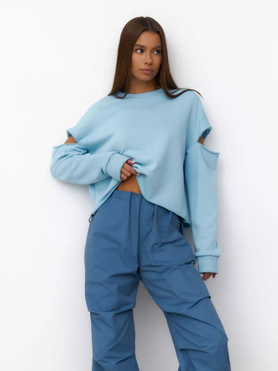 Damen lässiges Sweatshirt mit asymmetrischen Cut-Out-Details und oversized Schnitt Heidi-Mode