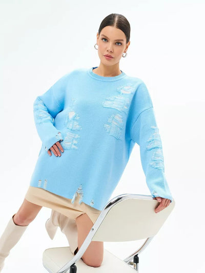 Damen Oversized Strickpullover mit modernem Distressed-Design und lässigen Fransen Heidi-Mode