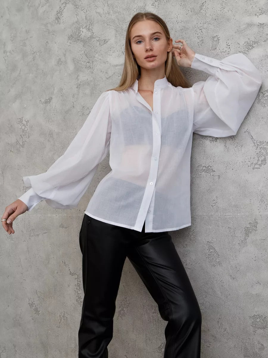 Damen Elegante Bluse mit voluminösen Puffärmeln und transparentem Stoff Heidi-Mode