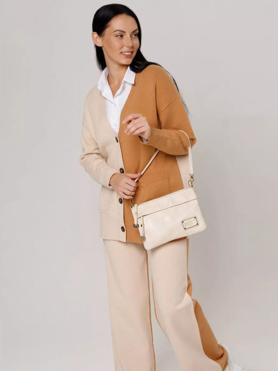 Damen lässiger Strickcardigan mit tiefem V-Ausschnitt und praktischen Taschen Heidi-Mode