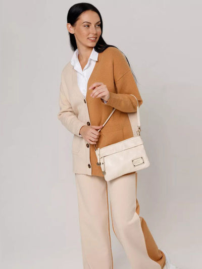 Damen lässiger Strickcardigan mit tiefem V-Ausschnitt und praktischen Taschen Heidi-Mode