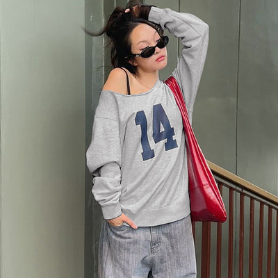 Damen sportlicher Oversized Pullover mit Off-Shoulder Schnitt und auffälligem Print Heidi-Mode