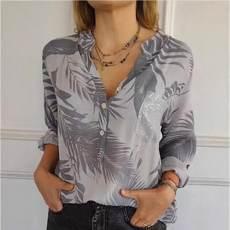 Damen Seidenbluse mit hochwertigem Palmblattmuster und eleganten Knopfdetails Heidi-Mode