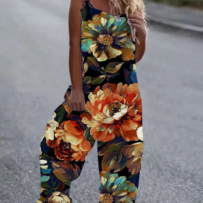 Damen luftiger Jumpsuit mit buntem Blumenmuster und verstellbaren Trägern Heidi-Mode