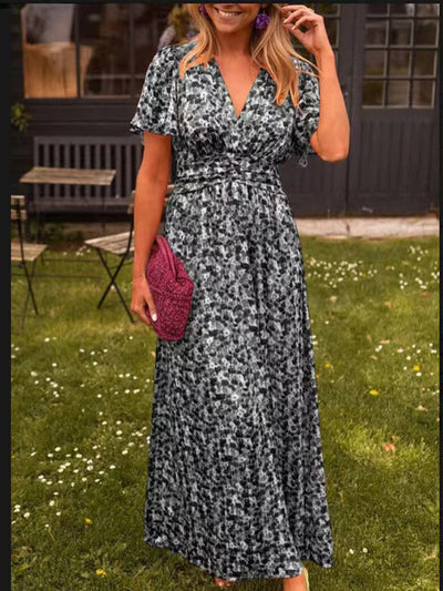 Damen Maxikleid mit voluminösen Ärmeln und tailliertem Schnitt Heidi-Mode