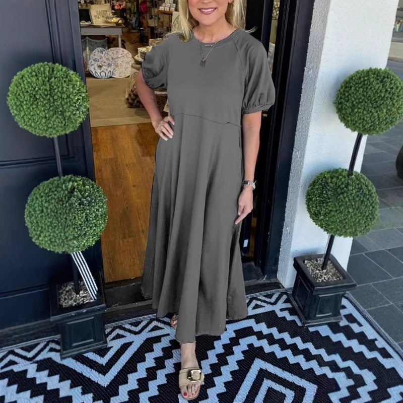 Damen Maxikleid mit schwingendem Schnitt und eleganten Puffärmeln Heidi-Mode