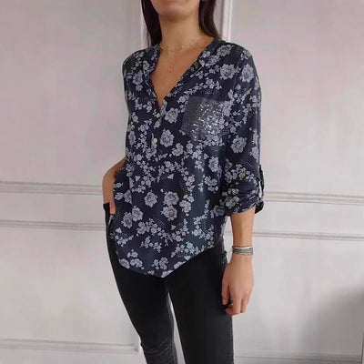 Damen Bluse mit floralem Design und funkelnden Pailletten Heidi-Mode