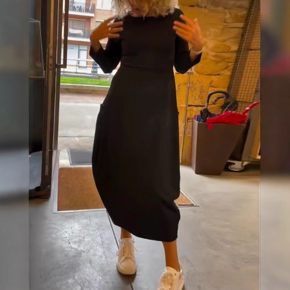 Damen Midi-Kleid mit asymmetrischem Saum und praktischen Taschen Heidi-Mode