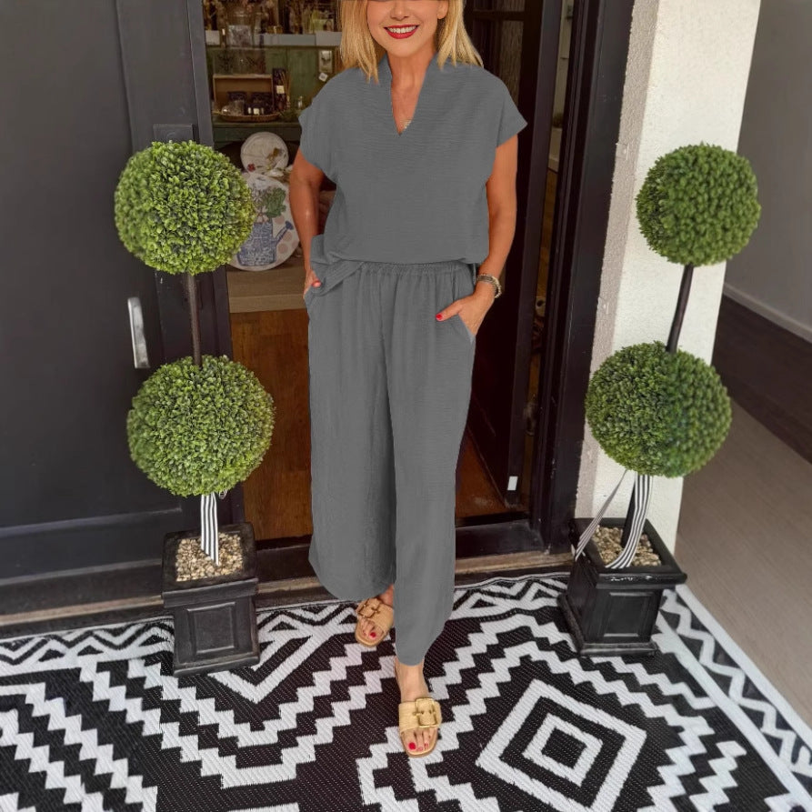 Damen Jumpsuit mit lockerer Passform und elegantem V-Ausschnitt Heidi-Mode