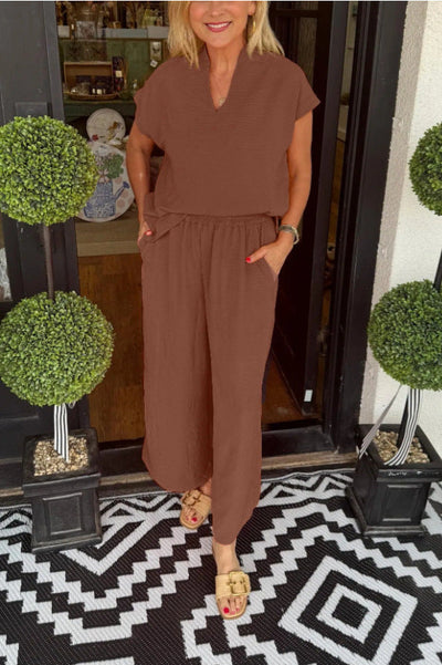 Damen Jumpsuit mit lockerer Passform und elegantem V-Ausschnitt Heidi-Mode