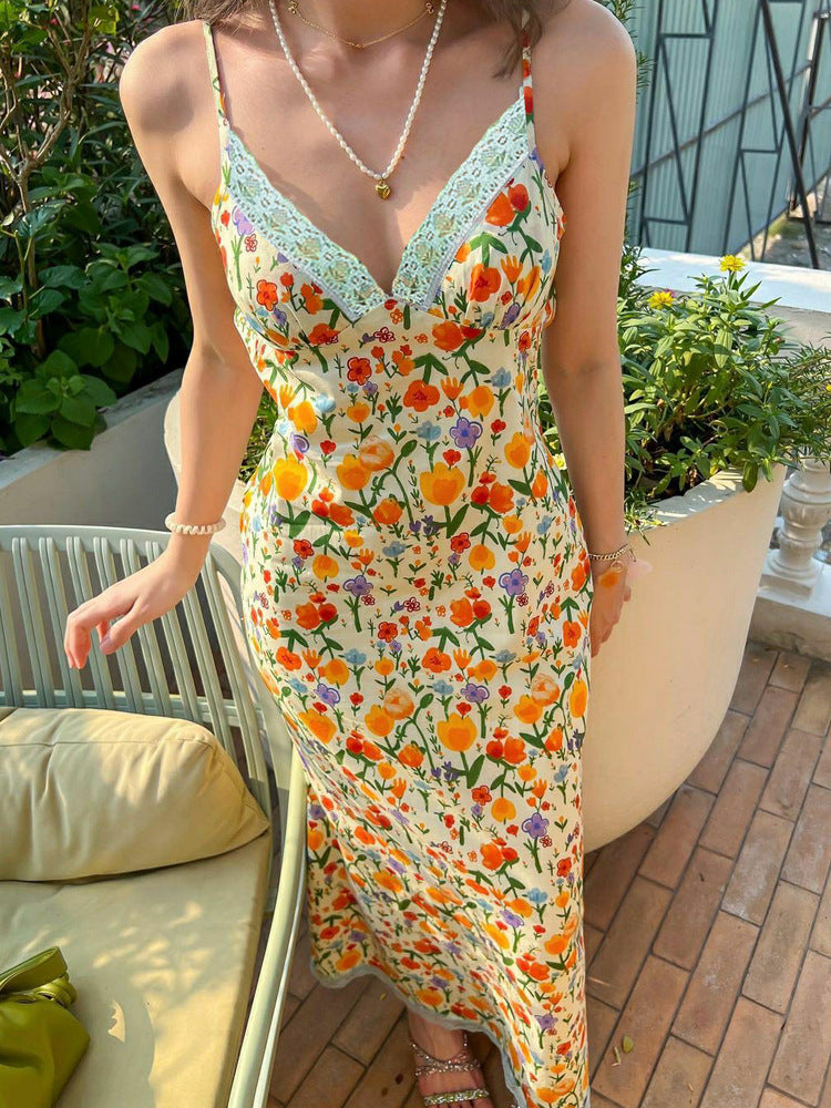 Damen Maxikleid mit floralem Muster und elegantem Rückenausschnitt Heidi-Mode