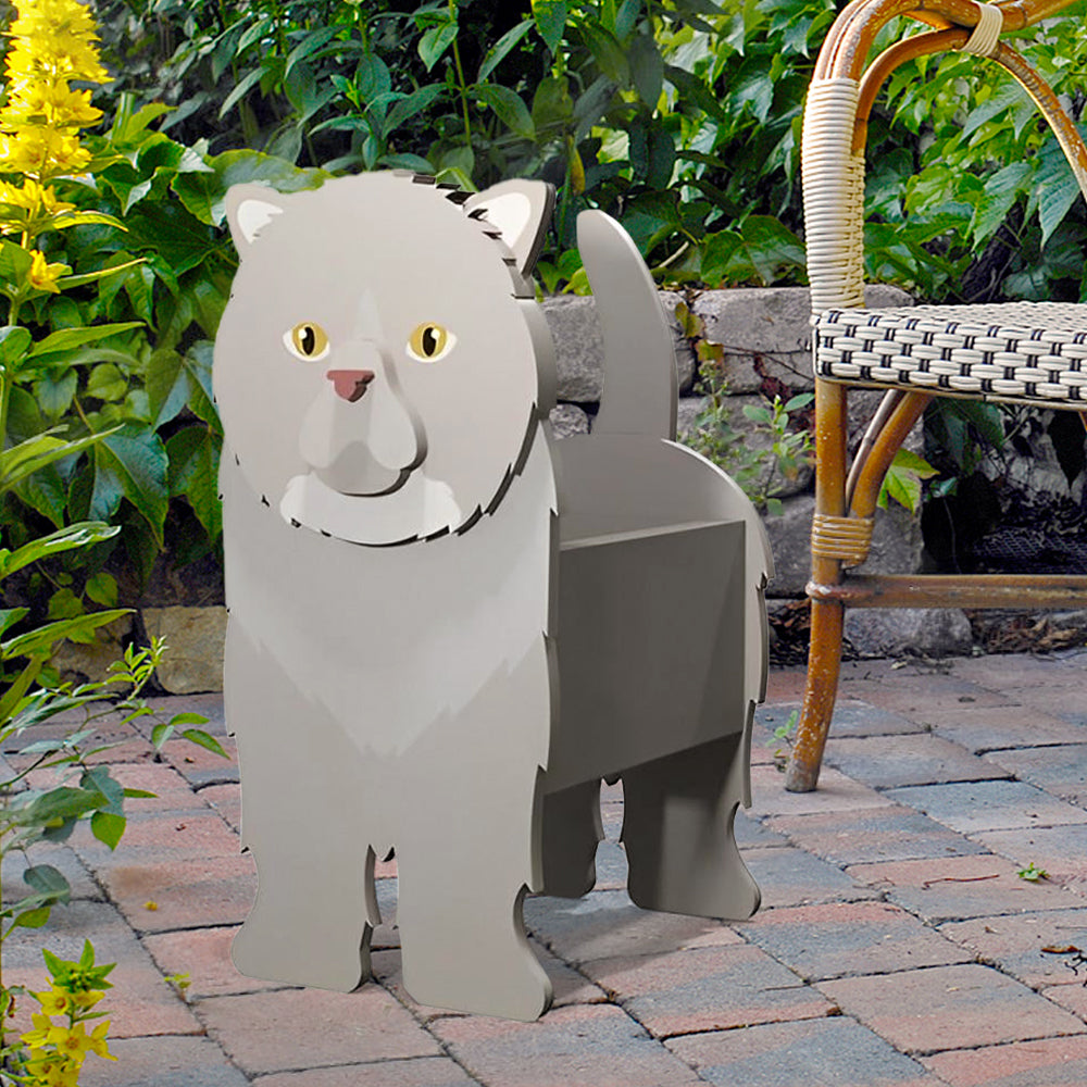 Exotische Kurzhaarkatze im Blumentopf