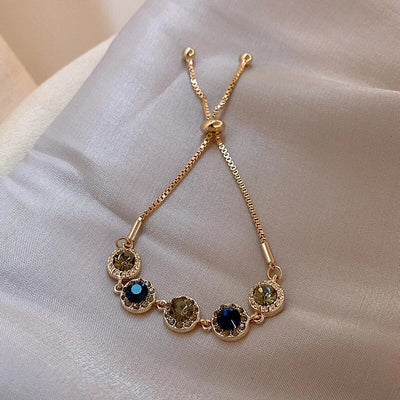 Verstellbares rundes Kristallarmband in Gold