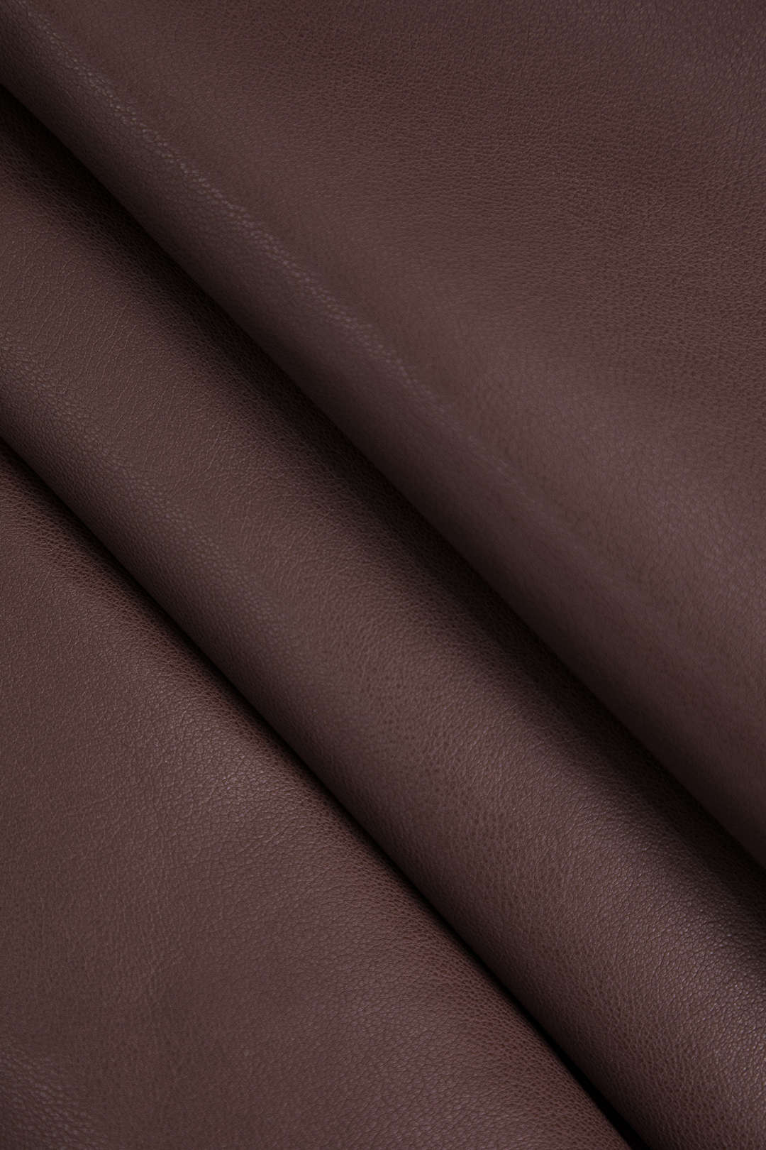 Marigold | Verspielter Kunstleder-Skaterrock mit High-Waist-Schnitt und ausgestelltem Saum