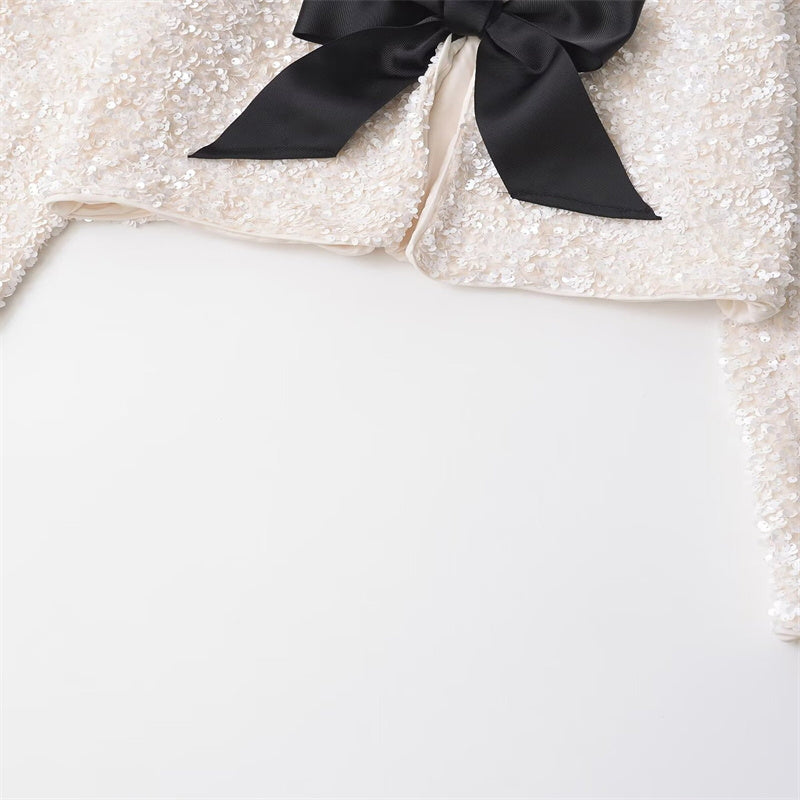 Robyn – Vielseitiger Kurzmäntel mit Schleifendekoration und Pailletten