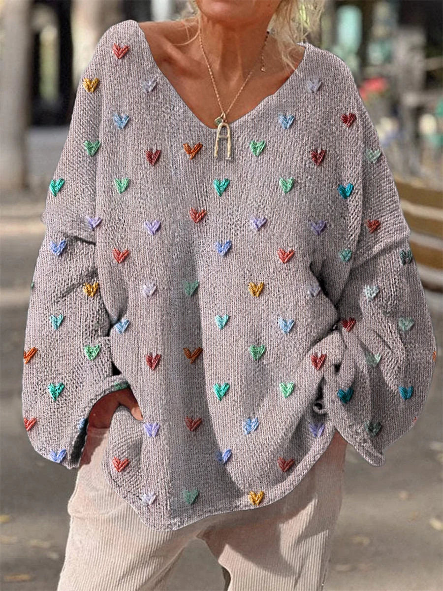 Damen Strickpullover mit bunten Herzmotiven und V-Ausschnitt