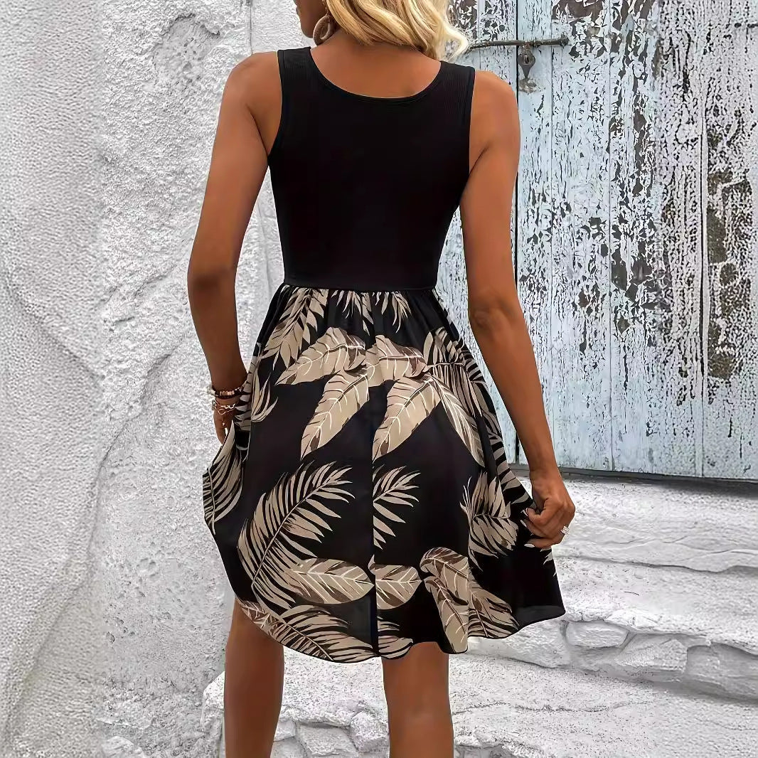 Amelia – Elegantes Kleid mit Spitze und tropischem Druck