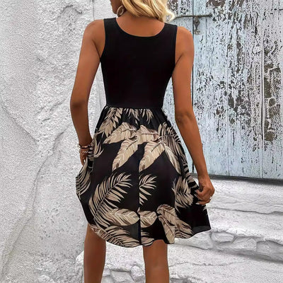 Amelia – Elegantes Kleid mit Spitze und tropischem Druck